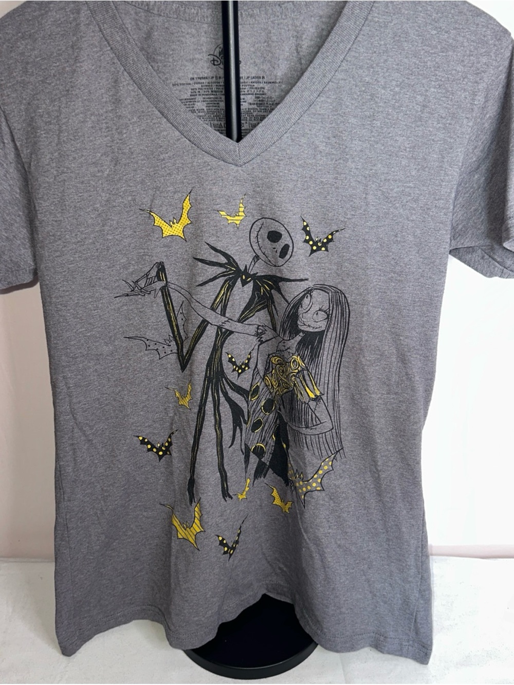 Disney Gray V-Neck Tee with Yellow Graphic Accents